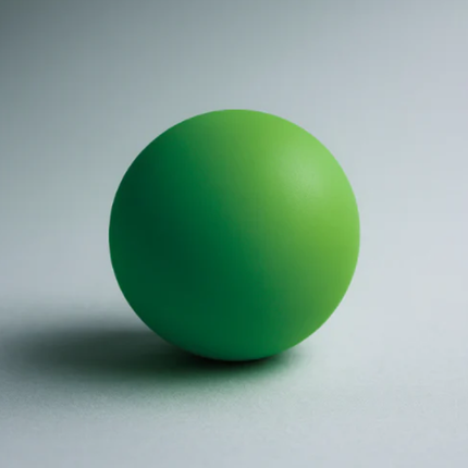 Green ball on a gray background