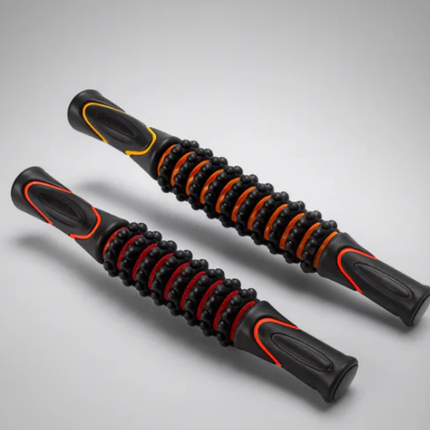 Two black and orange massage rollers on a light gray background