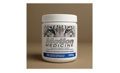 Container of 'Motion Medicine' with a tiger design on a brown background