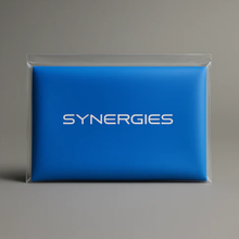 Blue package with 'SYNERGIES' branding on a gray background