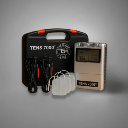 TENS 7000 electronic device with accessories on a gray background